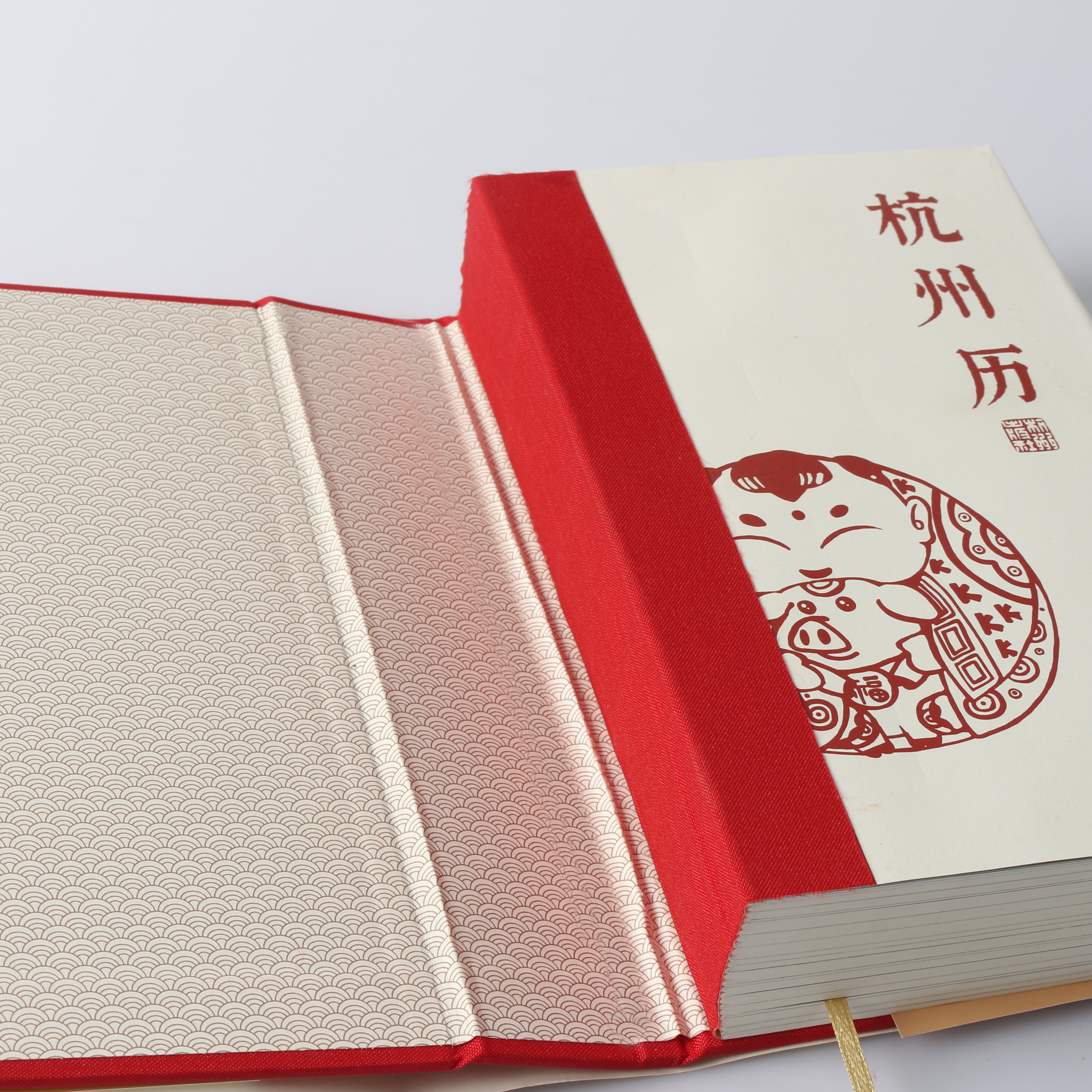 Loose Back Cloth Spine Hardcover with Patterned Endpapers